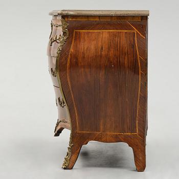 A rococo parquetry commode by C. G. Willkom (master in Stockholm 1763-65).