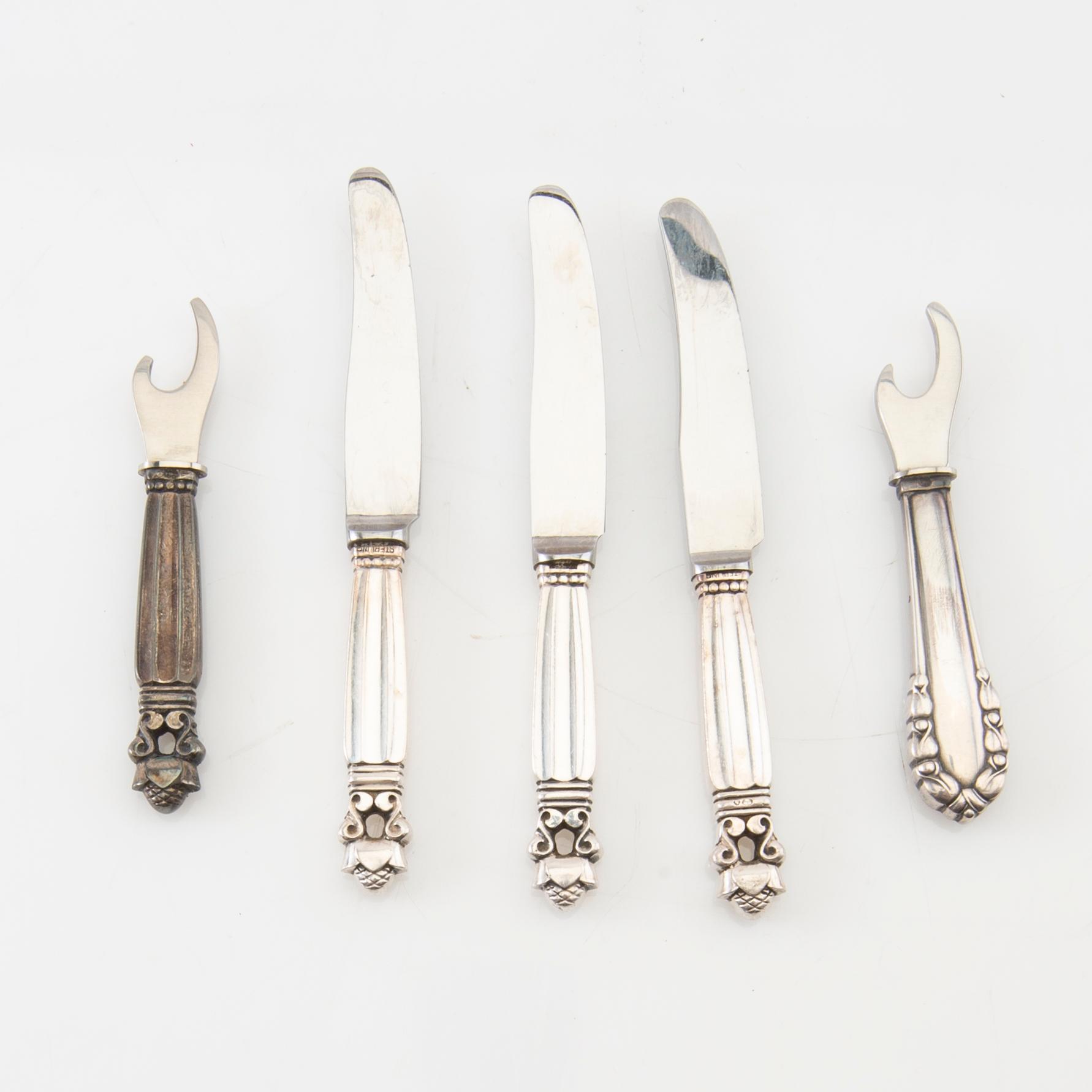 Johan Rohde, knivar 23 st + kapsylöppnare sterlingsilver  "Konge/Acorn" för Georg Jensen Danmark 1900-talets första hälft.