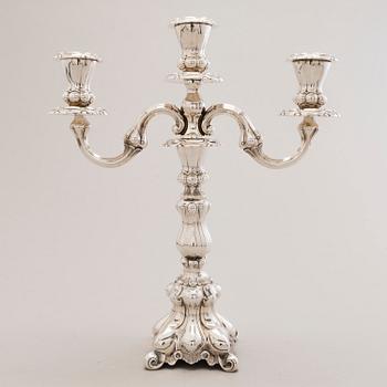 A silver candelabrum and a pair of silver candlesticks, Kultakeskus, Hämeenlinna, Finland 1979-91.