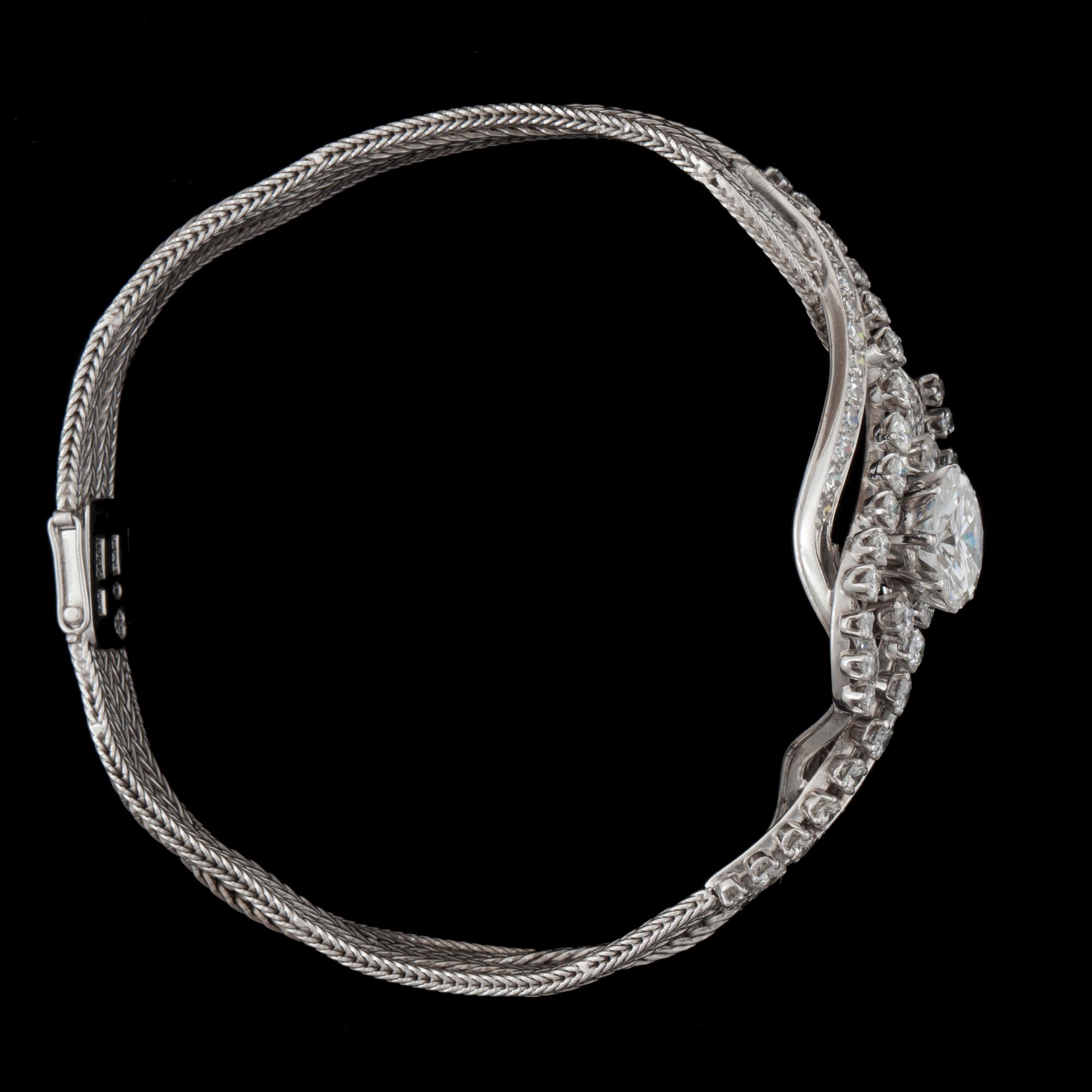 ARMBAND med diamanter. Briljantslipad diamant i mitten cirka 3.00 ct, kvalitet ca H/VVS.