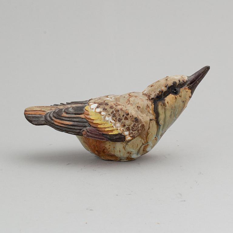 TYRA LUNDGREN, a stoneware sculpture of a bird, signed.