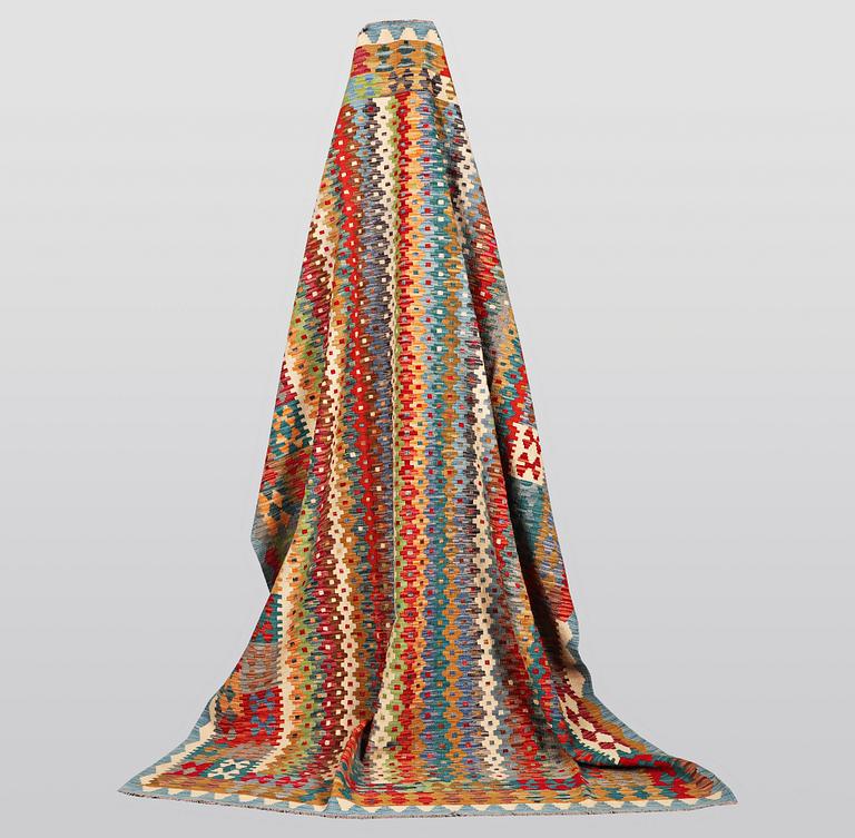 A carpet, kilim, ca 294 x 197 cm.