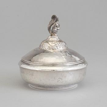 A Swedish Art Nouveau lidded silver box topped with a chipmunk, maker's mark Carl Sandberg, Ystad, 1919.