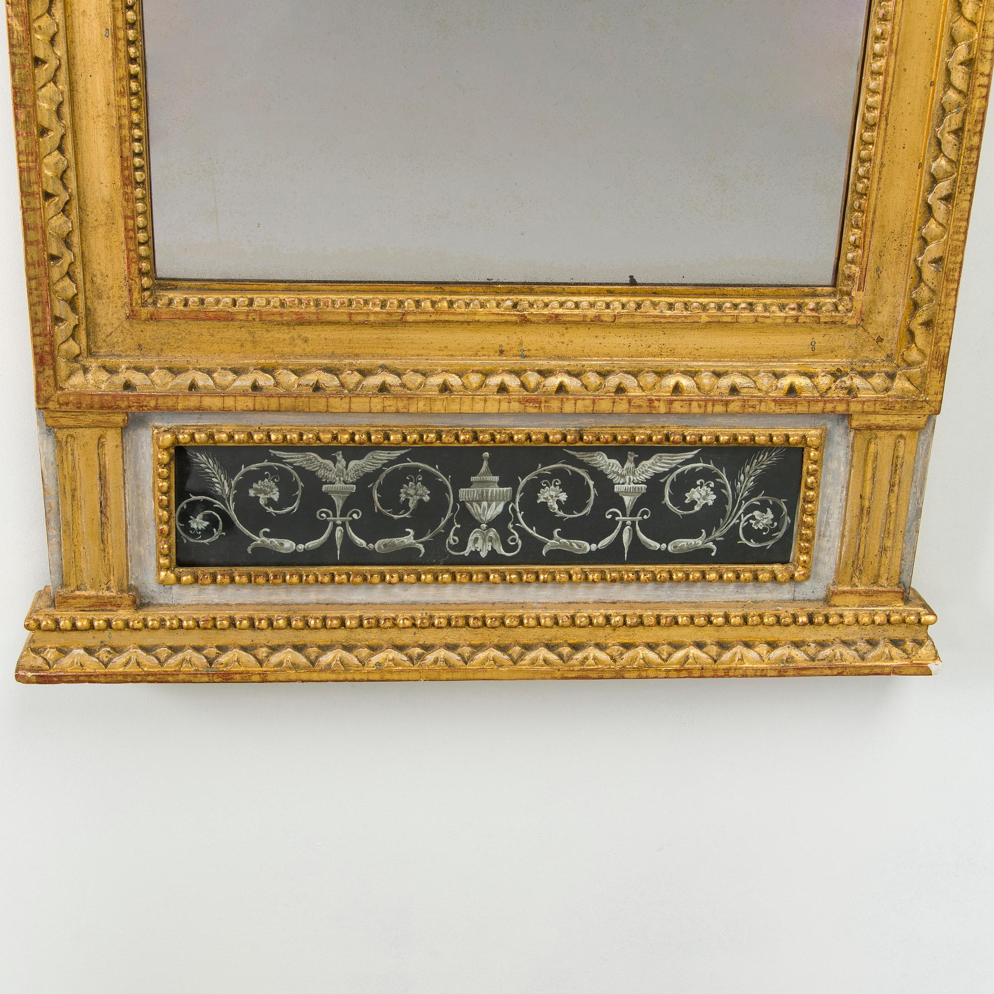 A mirror by Fredric Johan Foeder or Fjäder, (Master in Turku 1782-1832). Signed F.J.F and hallmarked in Turku.