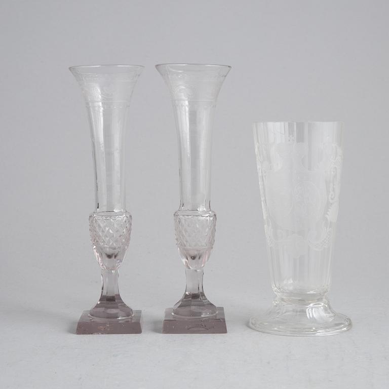 Two champagne glasses, first half of the 19th century, and a beaker, 20th century.
