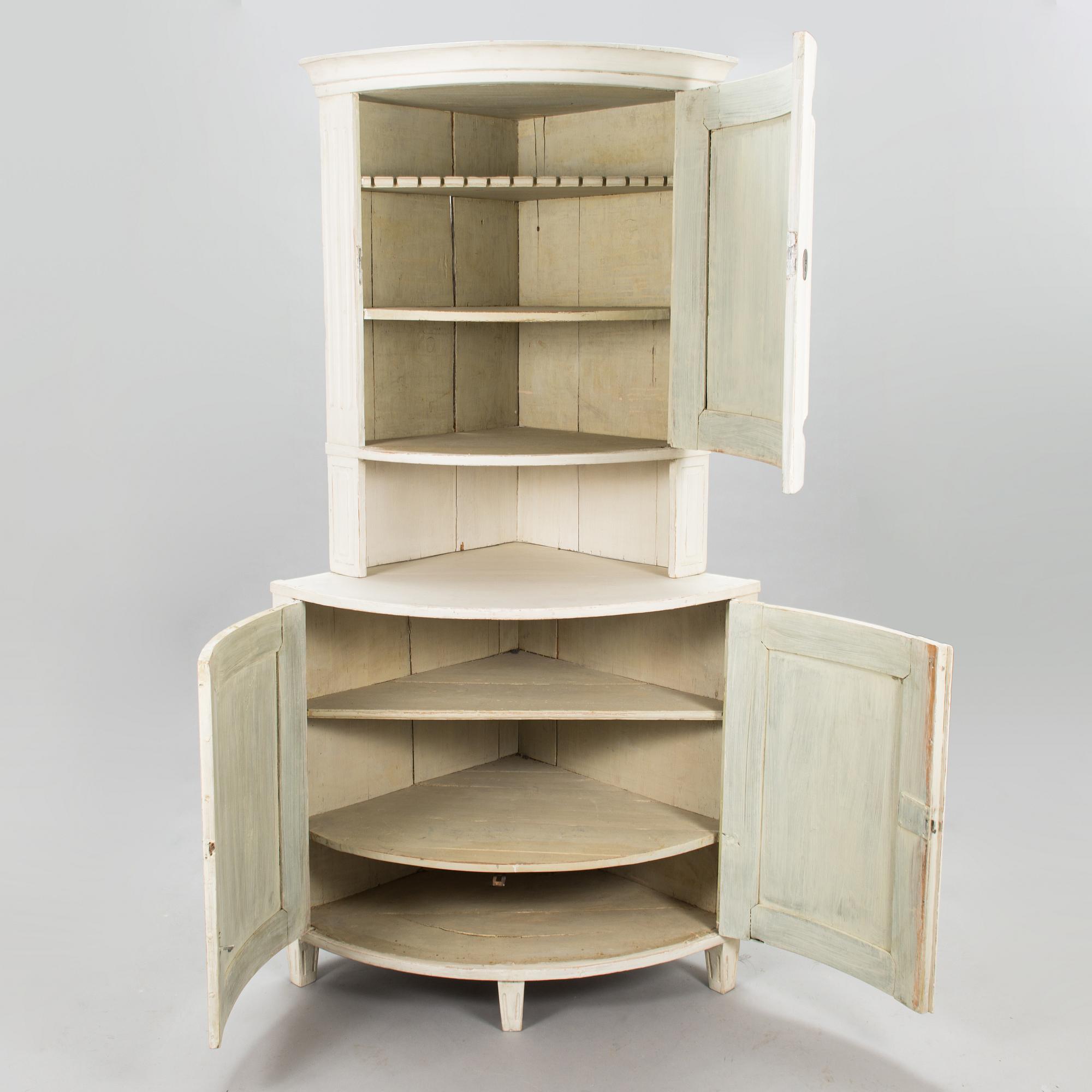 A Gustavian corner cabinet, late 18th century.