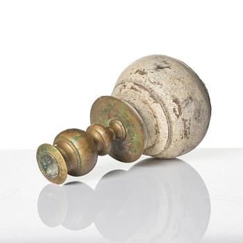 A Northern European baroque candlesticks, late 17th century, with a repaired wooden base.
