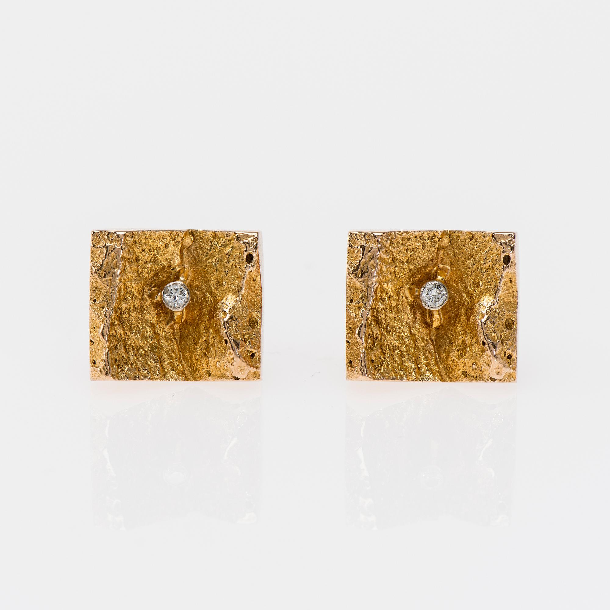 MANSCHETTKNAPPAR,"Gullies" Björn Weckström, Lapponia 1965. 14K guld, briljantslipade diamanter. Vikt ca 13,1 g.