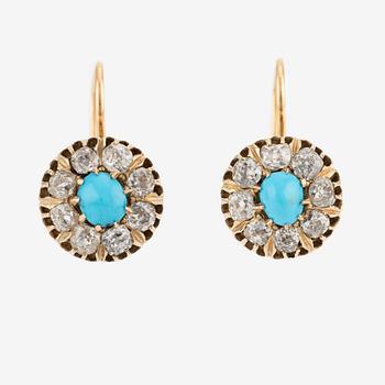 A 14K gold ring and a pair of earrings with turquoises and old cut diamonds.