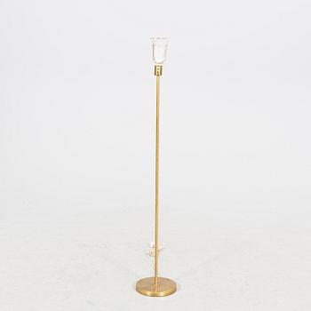 An NK 1960s brass floor lamp.