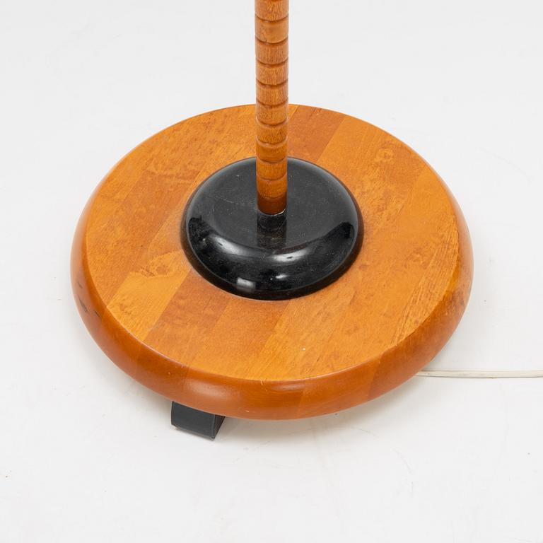 A stained beech floor light, Markslöjd, late 20th Century.