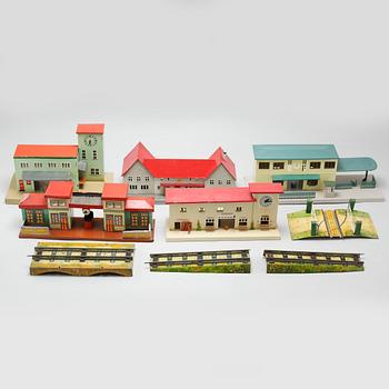 Eight 20th century train model accessories, Germany and England.