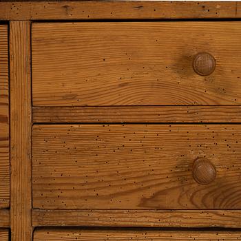 A pinewood cabinet, later part of the 19th Century.