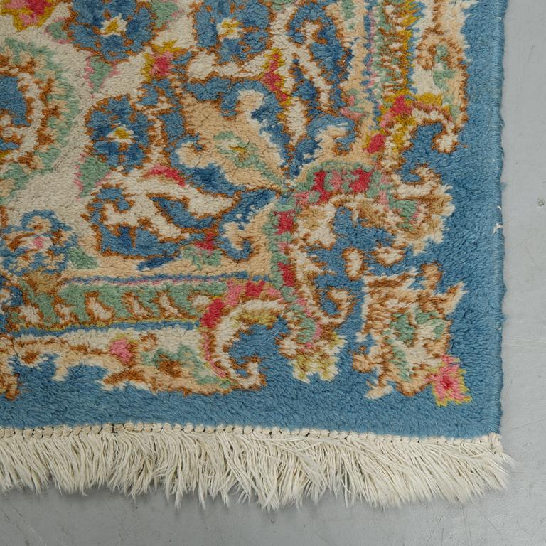 Matto, a semi-antique/an old Kerman, ca 270,5-272,5 x 182-183 cm.