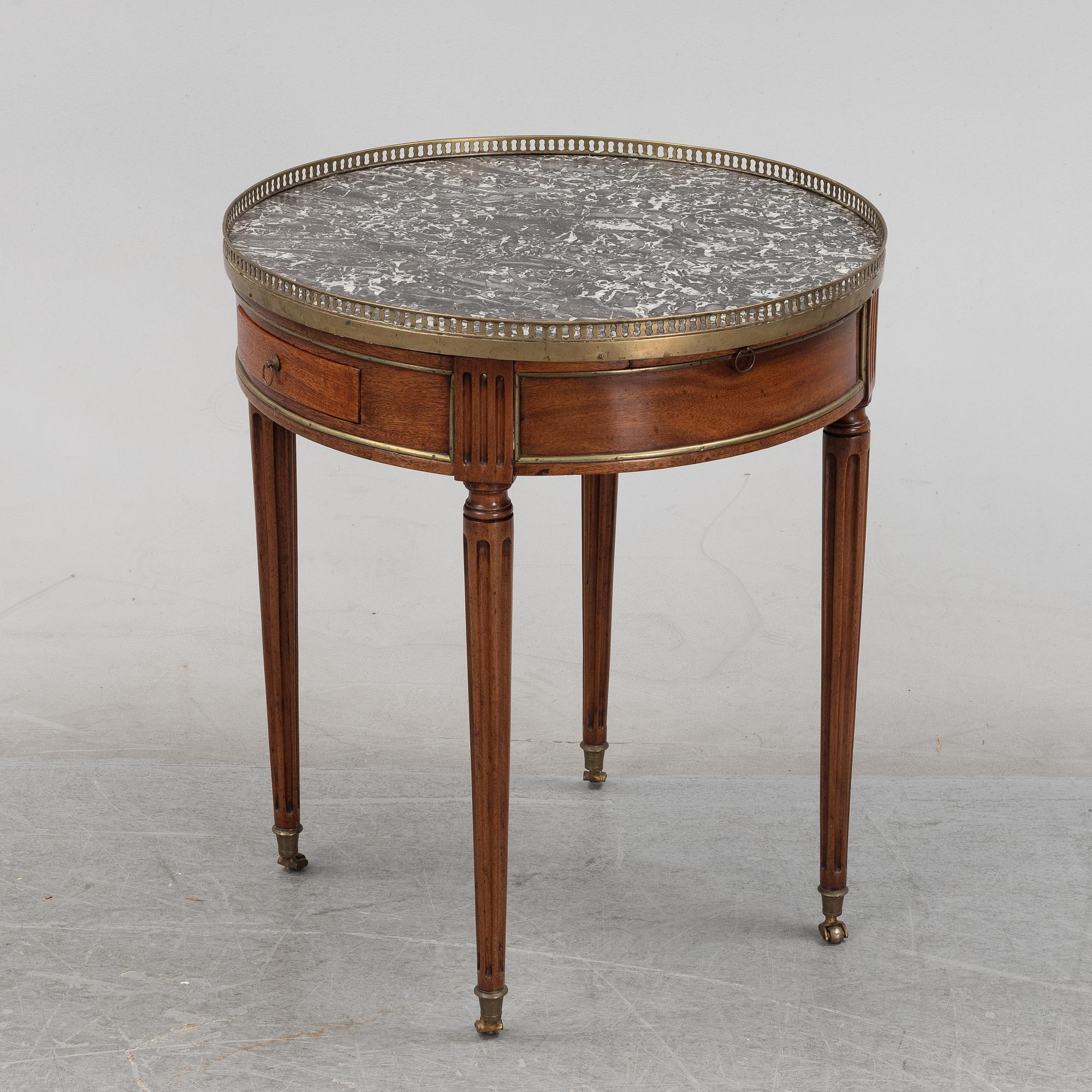 A Louis XVI-style table end of the  19th Century.