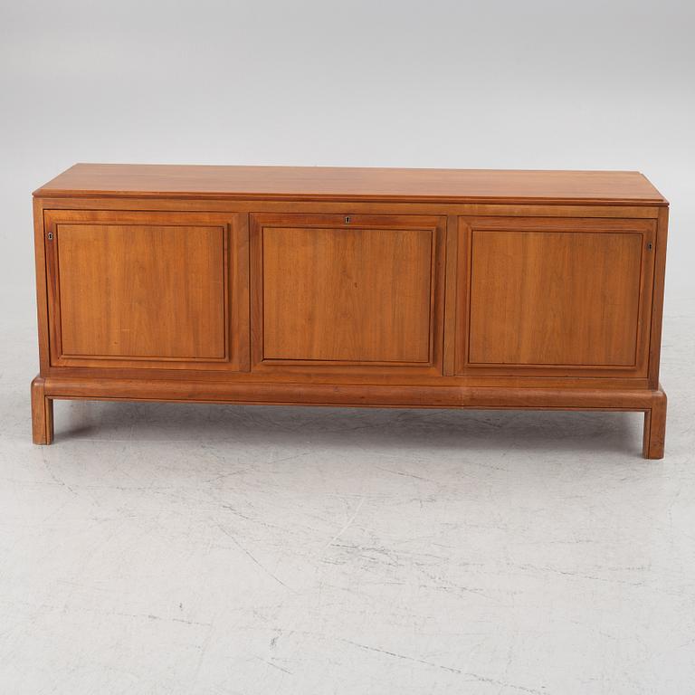 a walnut sideboard, Stockholm, 1932.