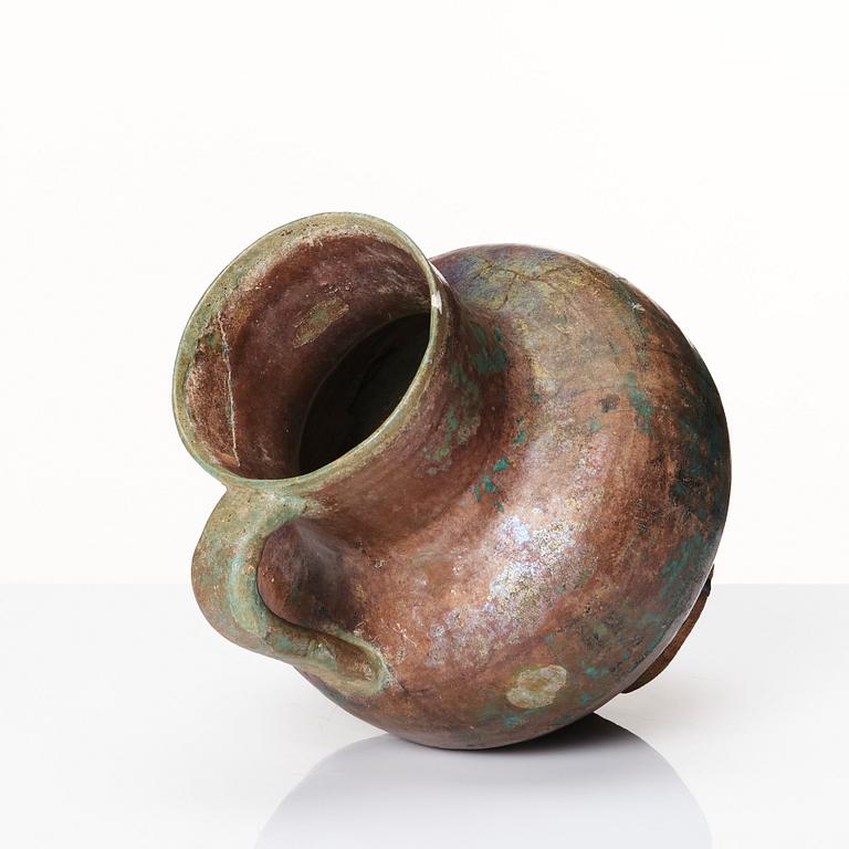 A 12-13th century turquoise and black underglazed jug.