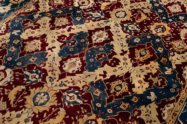 An Antique Agra carpet of 'Dragon Lattice' design, North India, 375 x 298 cm.