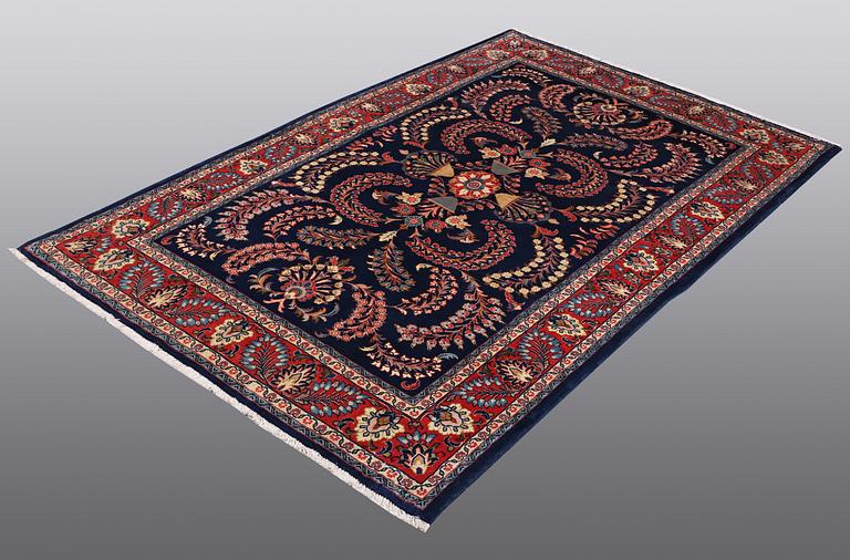 A RUG, Sarouk, ca 212 x 132 cm.