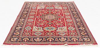 An oriental rug, c. 260 x 162 cm.