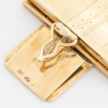 A 14K gold bracelet.