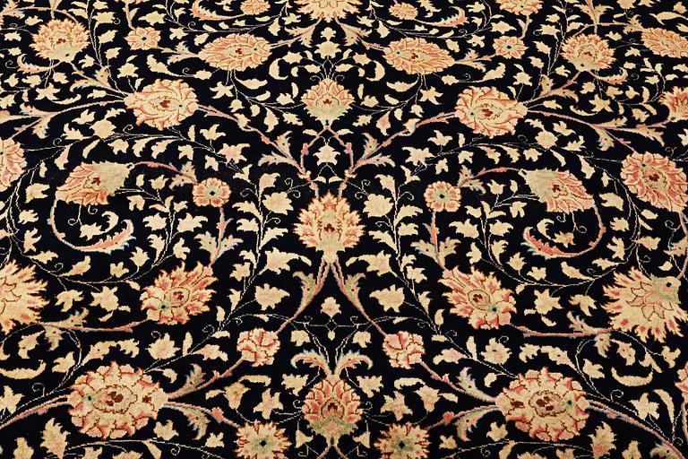 A Meshed carpet, c. 535 x 296 cm.