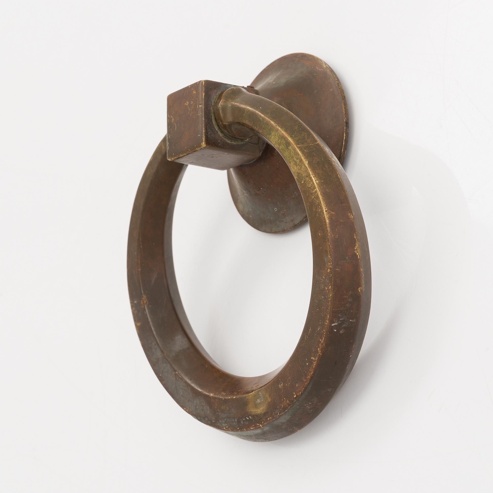 Dörrkläpp, brons, 1900-talets första hälft.