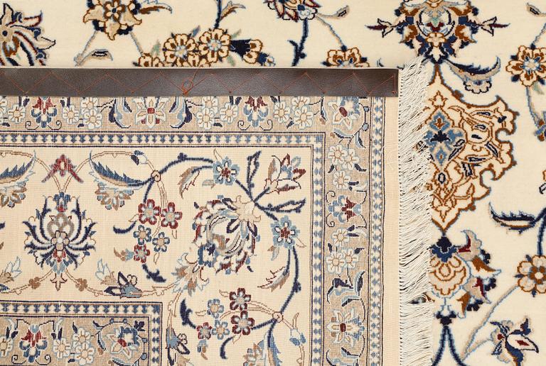 A Nain Part Silk carpet, S.K 6LAA, c. 334 x 250 cm.