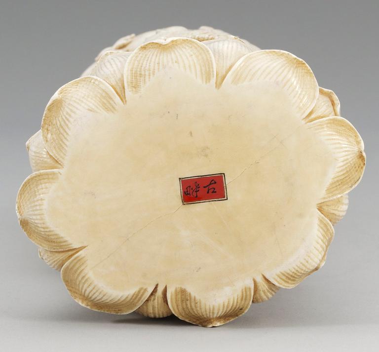 A Japanese ivory figure of Guanyin, probably Meiji period (1868-1912). Signed.