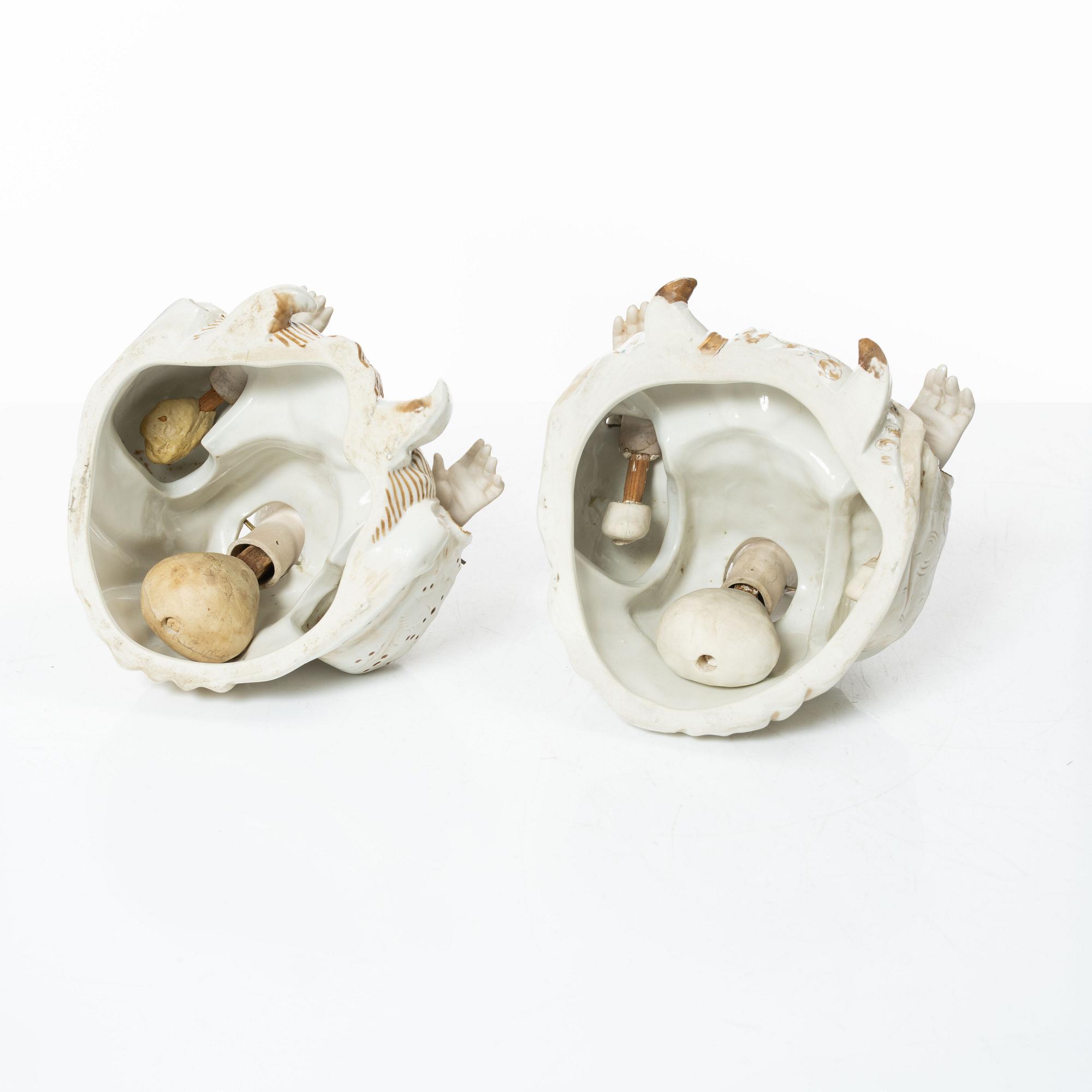 A pair of porcelain nodding head figures, Germany, 1920/30s.