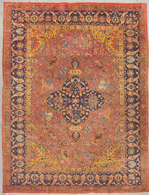 A semi-antique Indian carpet probable from Amritsar, around 325 x 250 cm.