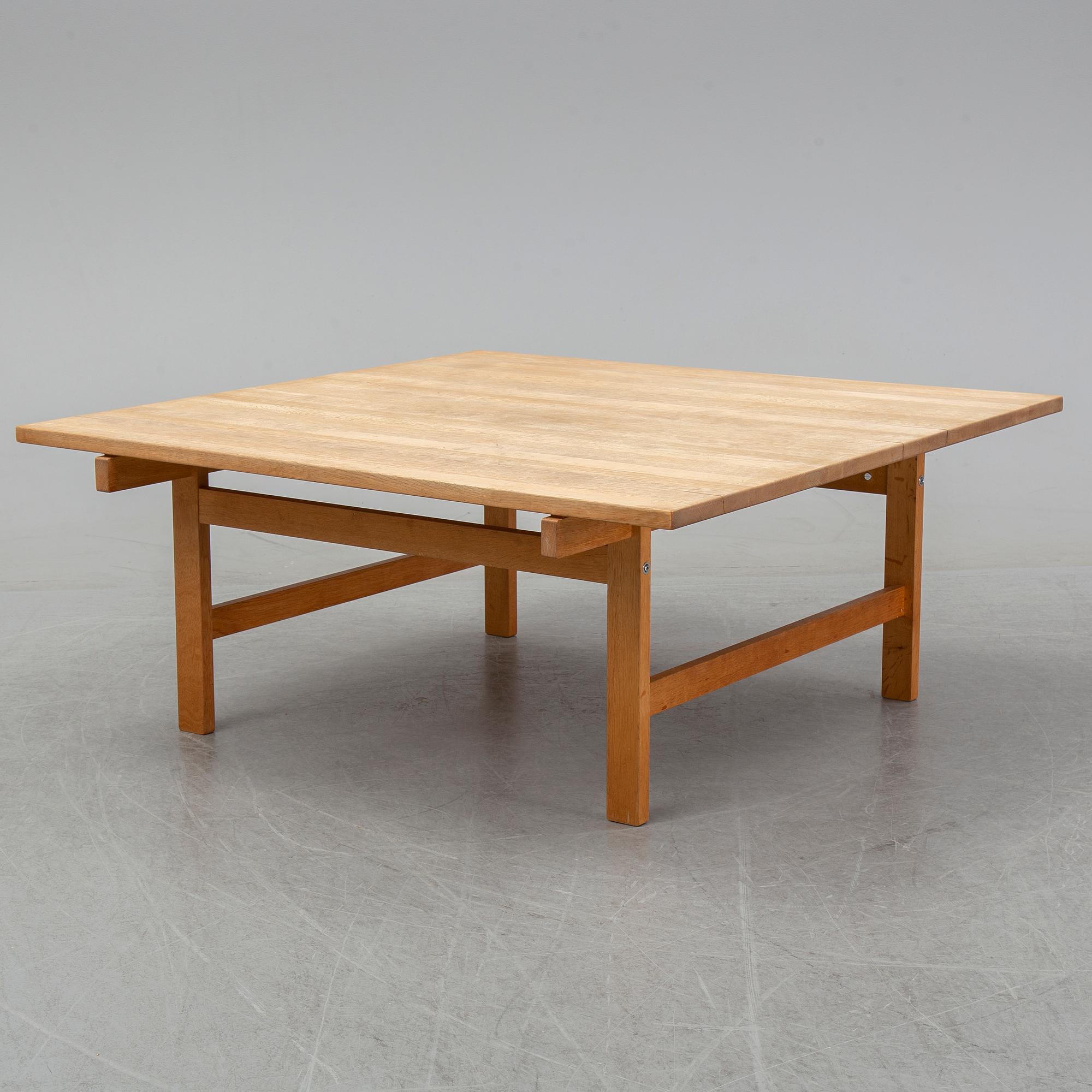 An oak coffee table by Hans J Wegner for Andreas Tuck, Denmark.