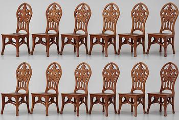 A Karl Tirén Art Noveau mahogany dining room set of furniture, comprising 15 pcs,by A.B Naeslunds Möbelfabrik.