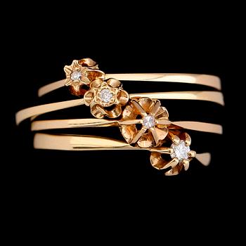 RINGAR, 4 st, 18 k guld med briljantslipade diamanter, 1900-talets andra hälft. Vikt ca 4 gram.