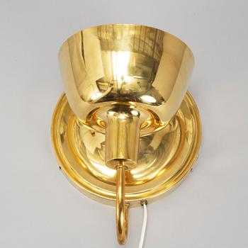 A brass wall light model 2389 by Josef Frank, Firma Svenskt Tenn.