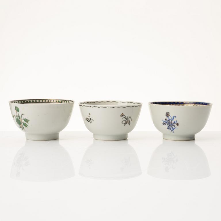 A group of nine Chinese export porcelain cups with stands, Qing dynasty, late 18th century.