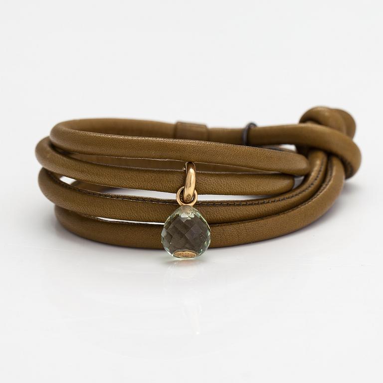 Ole Lynggaard, A 'Sweet drops' bracelet in leather with an 18K gold and green amethyst pendant. Denmark.
