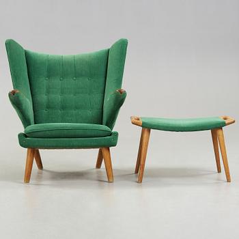 A Hans J Wegner 'Papa bear' esy chair with ottoman, AP-stolen, Denmark 1950-60's.