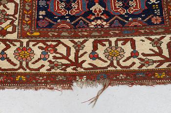 A rug, antique Kurdish, ca 247-253 x 116-125 cm.