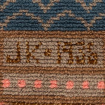 Pia Katerma, ryijy, Kajaanin kaupunginvaakuna. Päivätty 1936. Noin 196x130 cm.