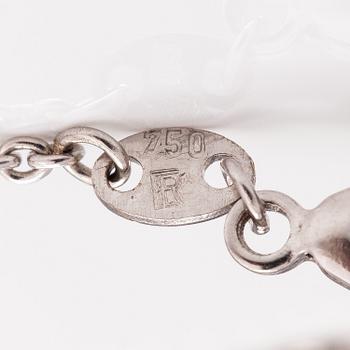 A Tillander, Kaulkoru, 18K valkokultaa, turmaliini, briolet-hiontainen timantti n. 0.56 ct. Helsinki 2001.