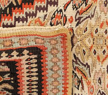 A semiantique Senneh carpet ca 159 x 106 cm.