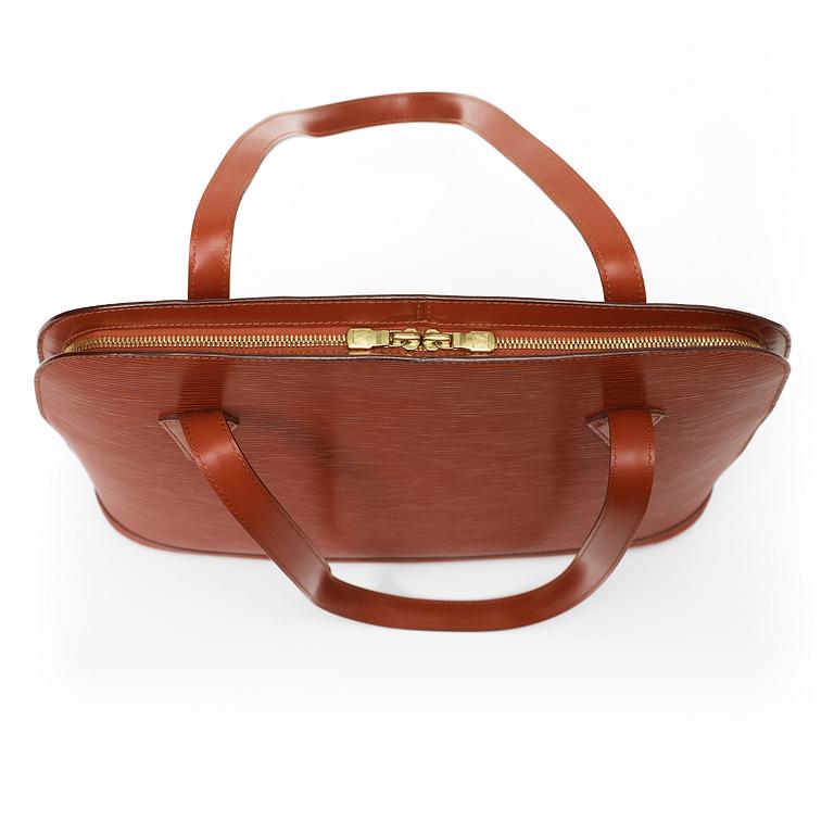 A 1999 terracotta epi leather handbag by Louis Vuitton.
