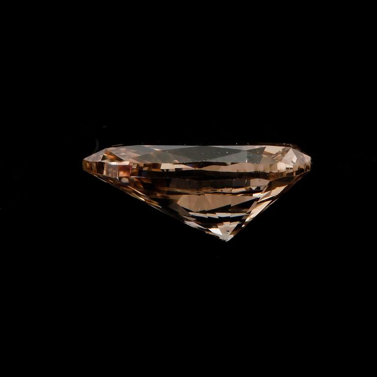 DIAMANT, oinfattad, champagnefärgad, ca 0,77ct.