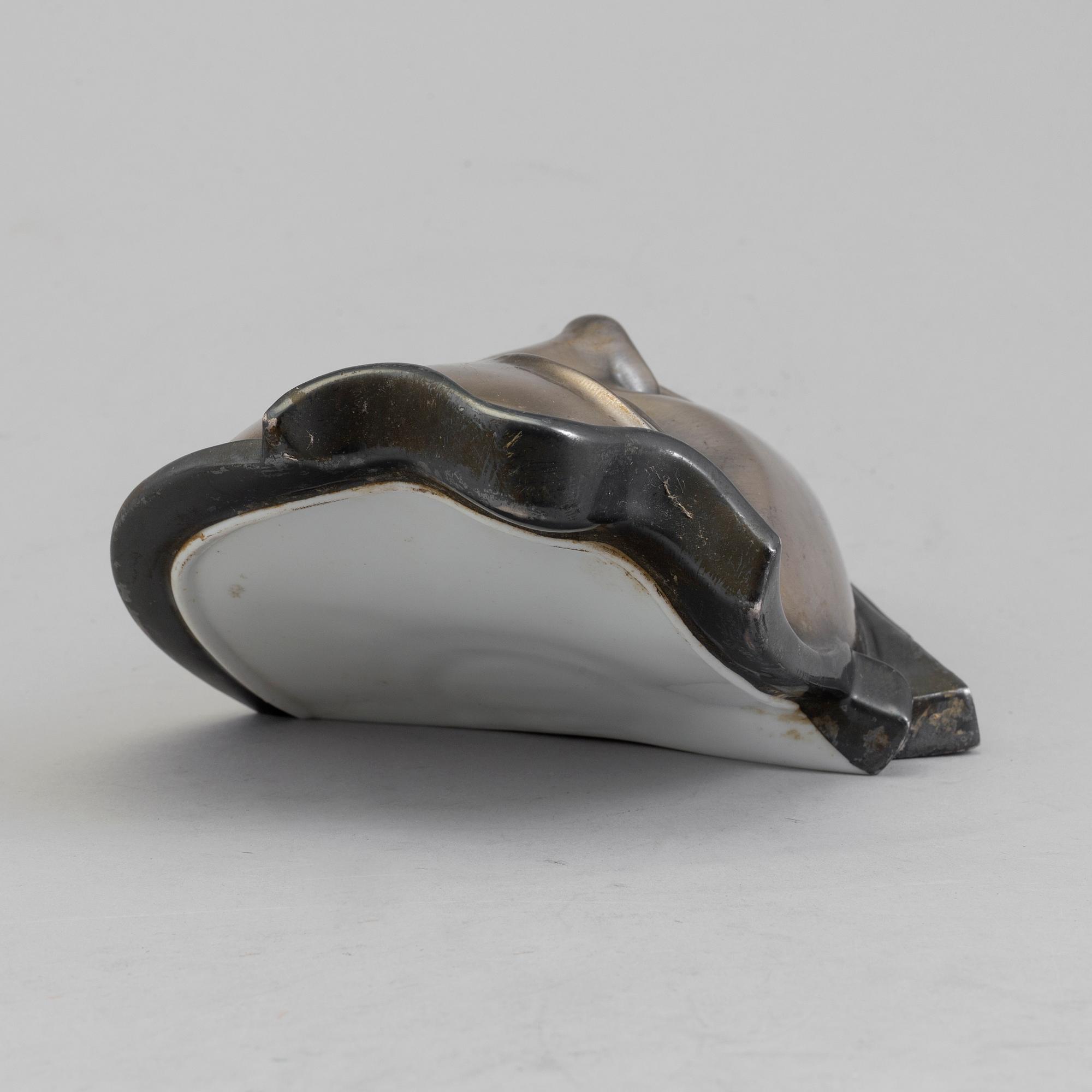 GERHARD SCHLIEPSTEIN, a porcelain and pewter mask from Rosenthal, Germany, 1920's.