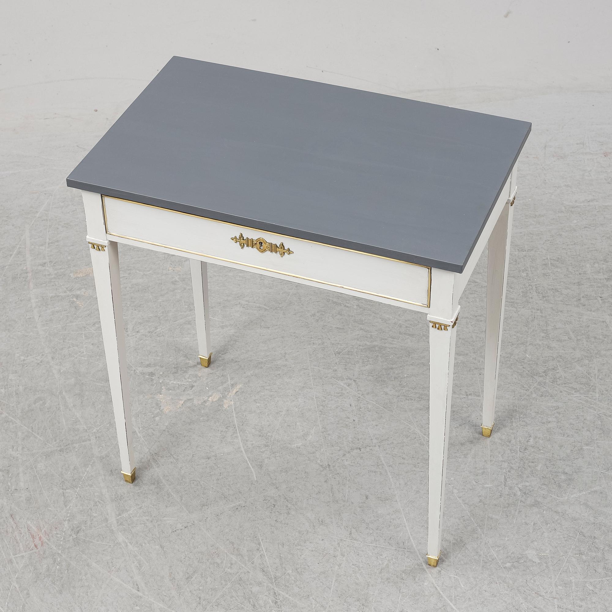 A Gustavian style table, first half of the 20th century.