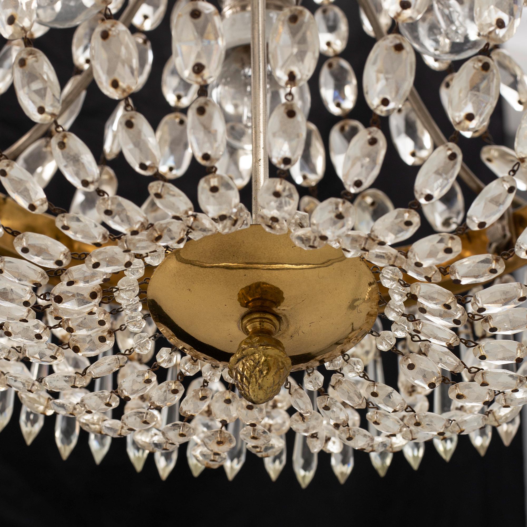 An Empire style chandelier, early 20th century.