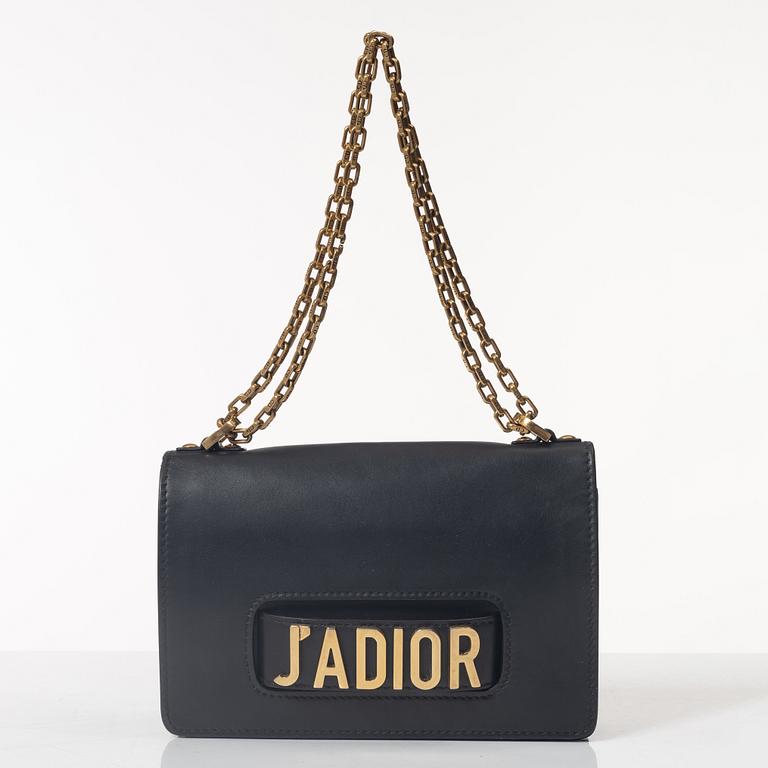 Christian Dior, A black leather "Dio(r)evolution" bag.