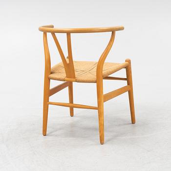 Hans J Wegner, a model 'CH 24' beech chair, Carl Hansen & Son, Odense, Denmark.
