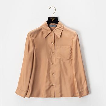 Prada, a apricot silk blouse, size 36.
